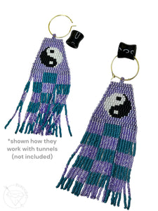 Purple hand beaded smiley face checkered dangle plugs dangle earrings - pair