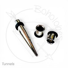 Load image into Gallery viewer, three metal tunnels, including a straight one and two round ones, against a white background.