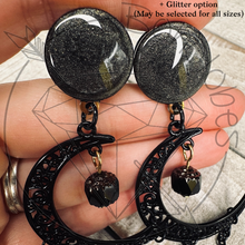 Load image into Gallery viewer, Black celestial Gold Czech crescent moon goth dangle gauges 8g 6g 4g 2g 1g 0g 11/32” 00g 7/16” 1/2” 9/16” 5/8” 11/13” 3/4” 13/16” 7/8” 1”
