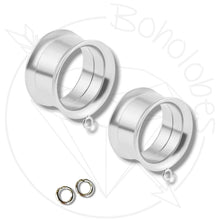 Load image into Gallery viewer, two silver-colored metal earring backs and two small metal rings, all set against a white background.