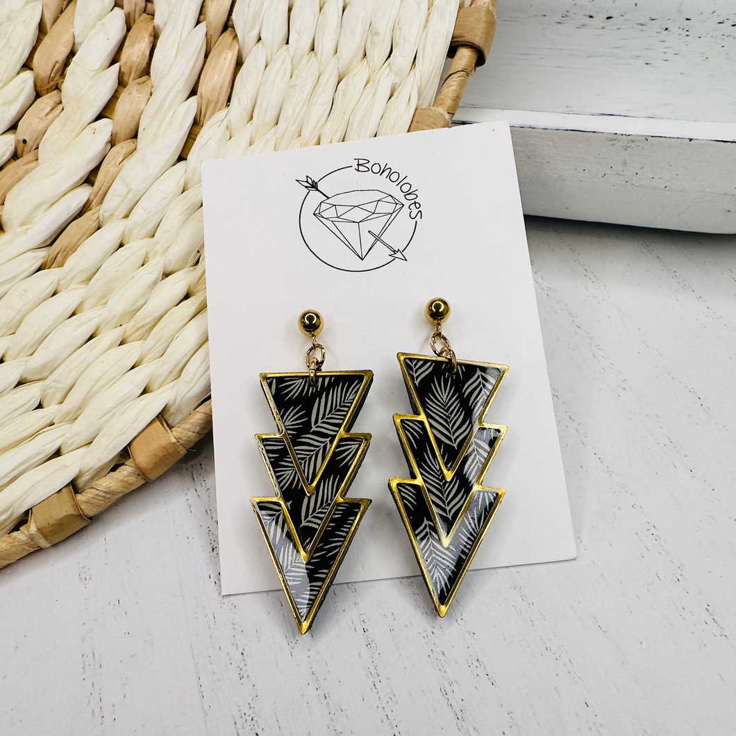 Black and gold leaf gold frame dangle earrings