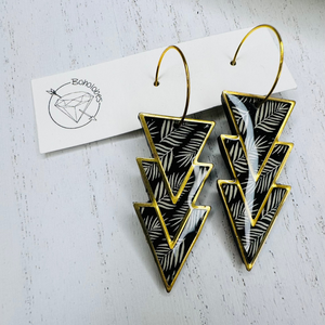 Black and gold leaf gold frame dangle earrings