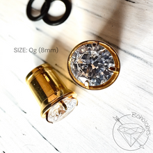 Load image into Gallery viewer, CZ Martini Studded Steel Tunnels: Yellow Gold Prong Setting, Gauged Ear Plugs 14g 12g 10g 8g 6g 4g 2g 1g 0g