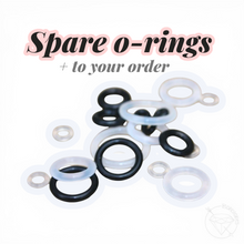 Load image into Gallery viewer, Plug O-Rings (Pair) – Black or Clear, Gauges 14g 12g 10g 8g 6g 4g 2g 1g 0g 11/32” 00g 7/16” 1/2” 9/16” 5/8” 11/13” 3/4” 13/16” 7/8” 1”