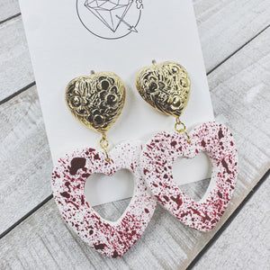 Pair of bloody valentine heart chunky metal dangle statement earrings