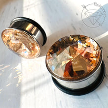 Load image into Gallery viewer, Austrian Crystal plugs stainless steel plugs for stretched ears Sizes: 00g 7/16” 1/2” 9/16” 5/8” 11/13” 3/4” 13/16”