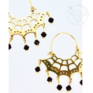 Pair of gold spider web beaded metal dangle earrings