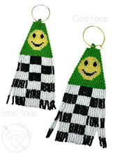 Load image into Gallery viewer, Hand beaded green smiley face checkered dangle plugs dangle earrings - pair
