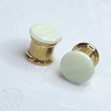 Load image into Gallery viewer, Screw-back mint green glass shank button hider plugs tunnels for gauged ears in 00g (10mm)